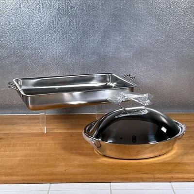 (2pc) CUISINART PANS  |
Including a Pennsylvania Dutch roasting pan and a handled baking pan, stainless steel - l. 16.5 x w. 10 in....