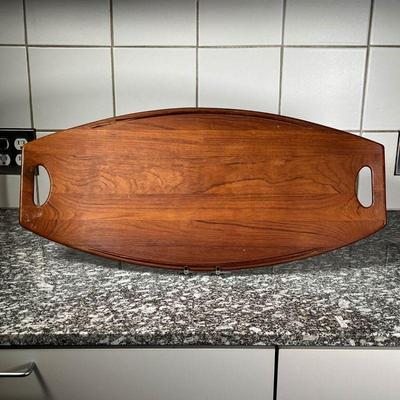 LONG SERVING PLATTER  |
Long wooden serving platter with handles on each end - l. 26 3/4 x w. 13 in.
