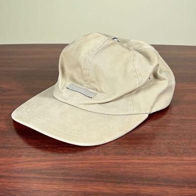 BURBERRY LONDON HAT  |
Beige baseball cap with Burberry logo at front, plaid button top, and plaid inside the visor