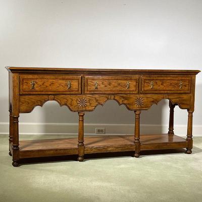 BAKER CONSOLE TABLE  |
Long hall table or sideboard, having three drawers over an open shelf with contrasting inlaid decoration - l. 72 x...
