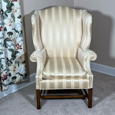 BAKER WINGCHAIR  |
Chippendale style wing chair with textured striped fabric - l. 33 x w. 33 x h. 45 in.