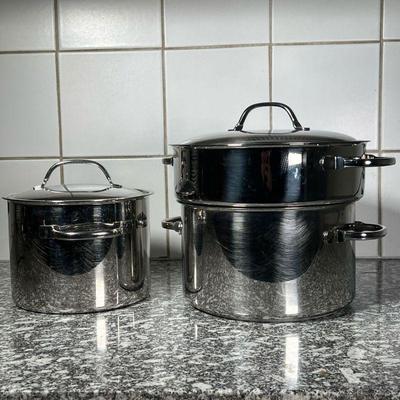 (2pc) STAINLESS COOKWARE  |
Stainless steel cookware of good quality, including a 8 inch pot, and a 5.75 inch tall 9.25 inch pot with...