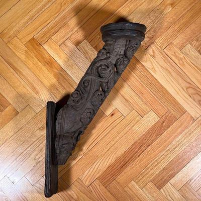 BAROQUE CARVED SCONCE  |
Architectural element with carved scrollwork designs mounting a large pricket candle holder - l. 8 x w. 6.5 x h....