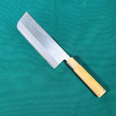 JAPANESE CHEFS KNIFE  |
6.75 inch blade with incised markings, having a wood and horn handle call mom with remnants of label at bottom...