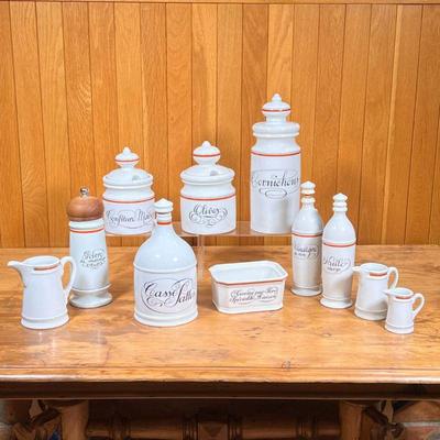 (11pc) D'AUTEUIL JARS ETC.  |
Porcelaine D'Auteuil Bistrot Rust Orange kitchen canisters etc., including a pepper mill, olive...