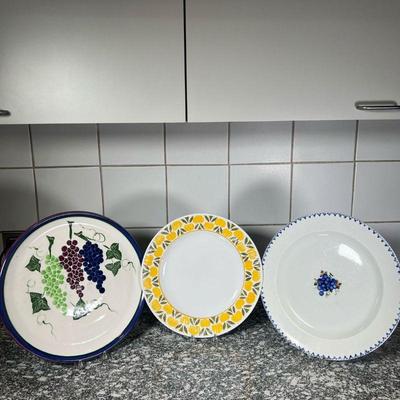 (3pc) MISC FRUIT DESIGN PLATES  |
One showing various grape decorations (dia. 13 1/2 in.), another showing purple grapes (dia. 13 in.),...