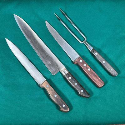 (4pc) MISC. CHEFS KNIVES  |
Including two Alfred Zanger Japan knives and a Zanger pitchfork (longest 15 in. overall) and a Zanger...