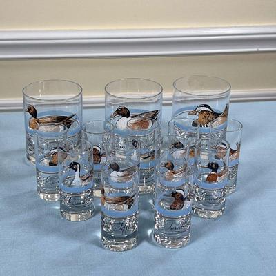(14pc) D'AUTEUIL BARWARE  |
Including three low drink glasses (h. 4 x dia. 3 in.) and 11 "shot" glasses all decorated with...