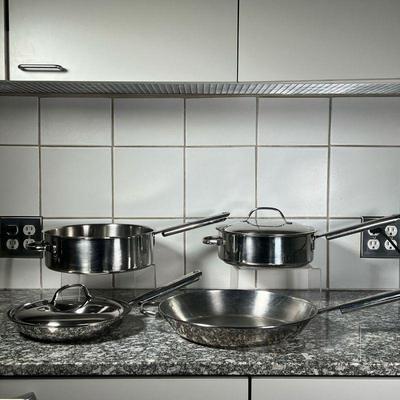 (4pc) CUISINART COOKWARE  |
Including a 10 inch frying pan, a 10.75 inch deep pan, a 10 inch low pot, and a 13 inch frying pan, with...