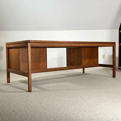 JENS RISOM EXECUTIVE DESK  | 
With two banks of drawers and a central support beam, no plaque or signature
- l. 74 x w. 36 x h. 28 in.