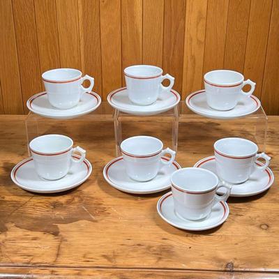 (14pc) D'AUTEUIL TEACUPS  |
French Porcelaine D'Auteuil Bistro Rust Orange cups and saucers, including seven teacups and seven...