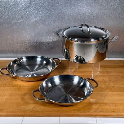 (3pc) STAINLESS COOKWARE  |
Stainless steel, unmarked but likely all Cuisinart, including a pot with steamer insert (h. 5 x dia. 10 in.)...