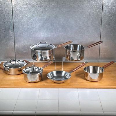 (6pc) CUISINART COOKWARE SET  |
Stainless steel, unmarked but all likely Cuisinart, with wood handles, some pieces with lids, including...