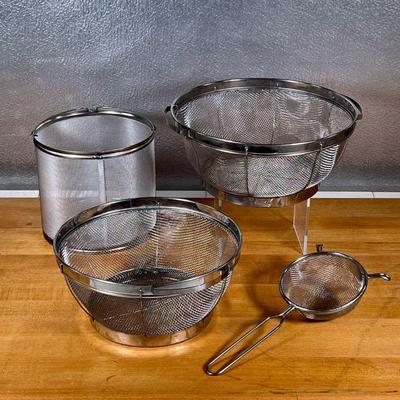 (4pc) SIFTERS & STRAINERS  |
Including a cylindrical strainer/sifter (h. 6.75 in.), a small handheld mesh sister, and two round...