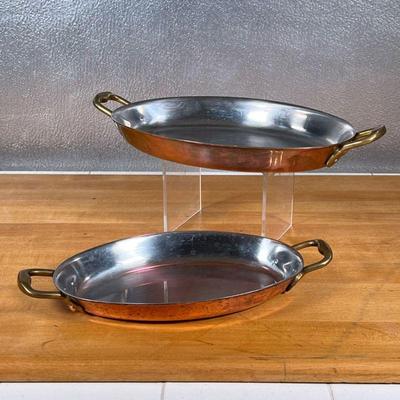 (2pc) CUISINART COPPER BAKEWARE  |
Two oval baking dishes with candles, Birthmarked on the bottom Cuisinart Belgium - l. 15 x w. 8.5 in....