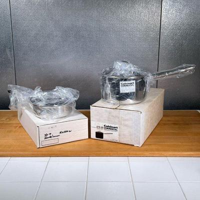 (2pc) CUISINART POTS  |
Cuisinart commercial stainless cookware, including a covered deep sauce pan (3-3/4 qt) and a 1.5qt pan - l. 16.25...