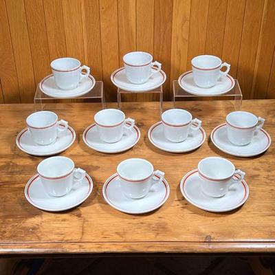 (20pc) D'AUTEUIL CUPS & SAUCERS  |
French Porcelaine D'Auteuil Bistro Rust Orange teacups and saucers, including 10 cups...