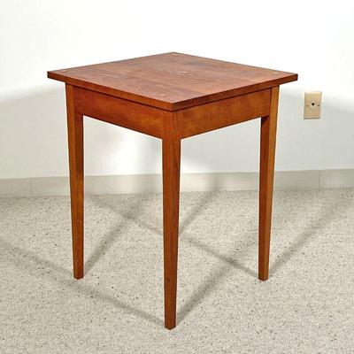 THOMAS MOSER SIDE TABLE  |  
C. 1991, solid wood, with confirming glass top, signed by maker and dated on underside - l. 20 x w. 20 x h....