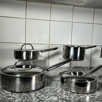 (4pc) CUISINART POTS  |
Stainless steel cookware, three of the pots marked Cuisinarts, one pot unmarked but with same handle, including...