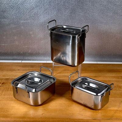 (3pc) STAINLESS CANISTERS  |
Stainless steel kitchen pantry containers, all with double handles and a lid, no apparent makers mark - l....
