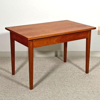 THOMAS MOSER LOW TABLE  | 
C. 1990, solid wood, with confirming glass top, signed by maker and dated on underside - l. 32 x w. 20 x h. 21...