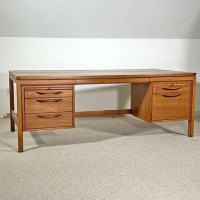 JENS RISOM EXECUTIVE DESK  | 
With two banks of drawers and a central support beam, no plaque or signature
- l. 74 x w. 36 x h. 28 in.