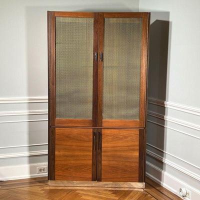 MID CENTURY CABINET  |
Upper cabinet doors having beveled glass with grill work over lower double cabinet doors with brass retaining...