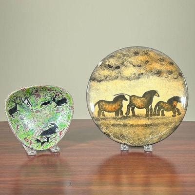 (2pc) ANIMAL POTTERY PLATES  |
One glazed plate showing what appears to be horses on a field, and the other a green dish showing a...
