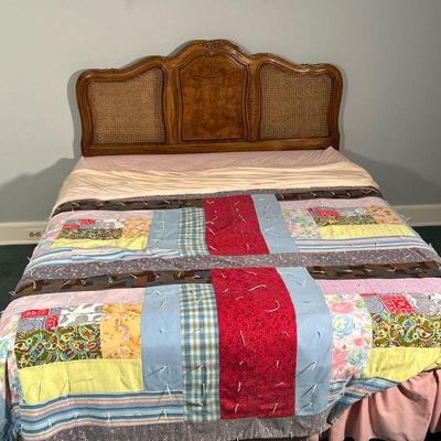 QUEEN CANED BEDFRAME  |
Carved wood headboard with caning, nicely figured burled wood, no footboard, with metal rails/mattress support -...
