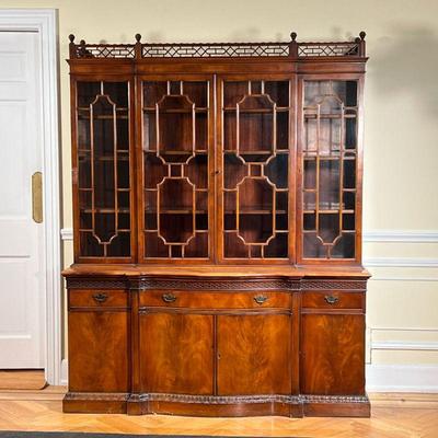 CHARAK BREAKFRONT CABINET  |  
Carved scalloped open work gallery for glazed cabinet doors over a serpentine front lower section with...
