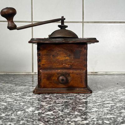 EARLY COFFEE GRINDER  |
Wood case with metal hardware, no apparent identifying marks - l. 5.75 x w. 5.75 x h. 6.75 in.