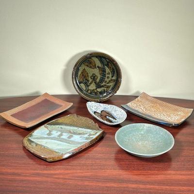 (6pc) MISC POTTERY TRAYS  |
Including a green ashtray with design on the inside (dia. 7 1/4 in. x h. 2 in.) , a brown tray with white and...