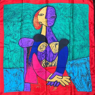 PICASSO SILK SCARF  |
Silk Picasso scarf with a colorful portrait within a red border, no apparent makers mark or tag - w. 33.5 x h. 35 in.
