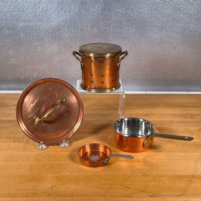 (4pc) MISC. COPPER COOKWARE  |
Including a lidded sifter, a small copper pot (overall l. 8 in.), and a small Restaurant Lasserre 3-inch...