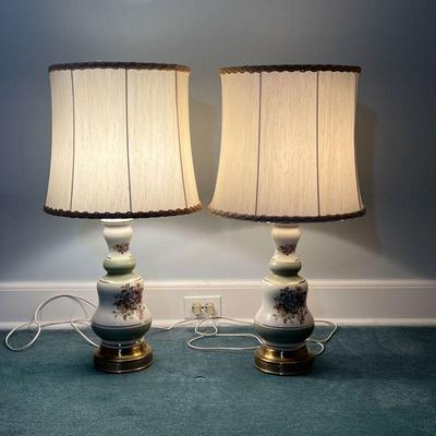 (2pc) PAIR PORCELAIN TABLE LAMPS  |
Green and white porcelain table lamps with transfer ware floral decoration with textured...