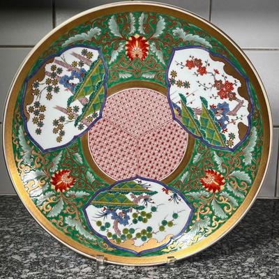 MONUMENTAL JAPANESE CHARGER  |
Heavy! Large charger dish having a Japanese design with green, red, and gold details, with blue underglaze...