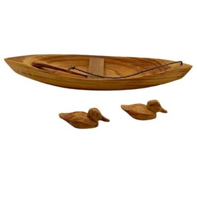 Lot 311
John Eliser Signed Canoe and Duck Cypress Carved Figurines