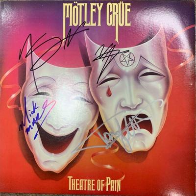 Motley Crue signed album