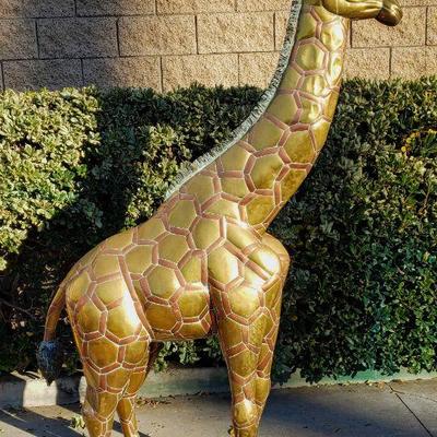 Approx. 6 foot tall copper & brass giraffe statue. 