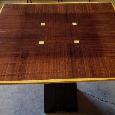 Outstanding lacquered game table with heavy steel base. 