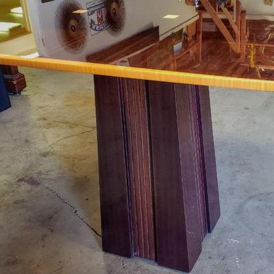 Outstanding lacquered game table with heavy steel base. 