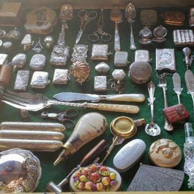 Antique sterling silver match safes, coin holders, flatware & other collectibles. 