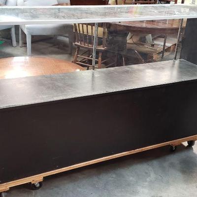 Glass showcases on wheels.