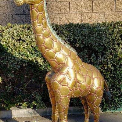 Approx. 6 foot tall copper & brass giraffe statue. 