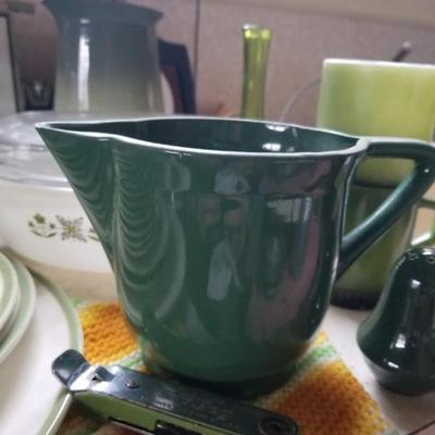 Green ceramic pitcher