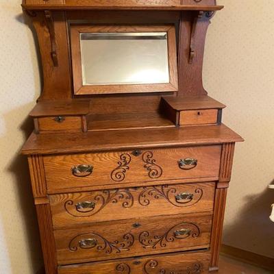 Antique Oak Chest of Drawers with Swing Beveled Mirror.