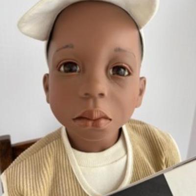 Gotz AAron Doll and Book

This Gotz Designer Doll AARON was produced in 1998 and was designed by doll artist PHILIP HEATH. He has an...