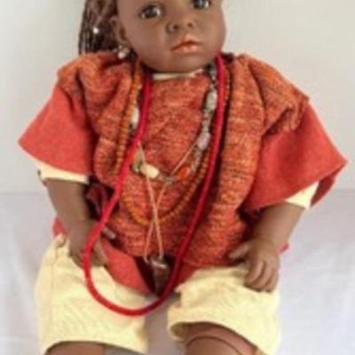 Gotz Carlos Doll

Full jointed, vinyl doll adorned with beaded jewelry measuring 22 inches.
