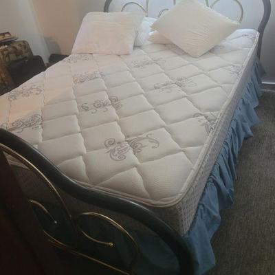 queen size bed with nearly new mattress and box spring
