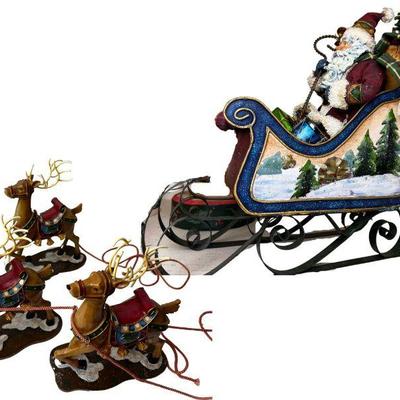 Santa Clause Figurine With Three Reindeer